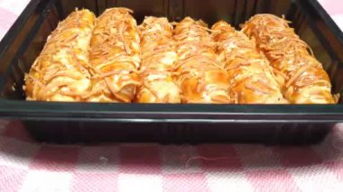baked homemade cheese pastry on baking tray