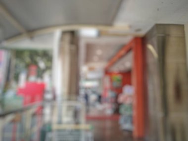 Soyut bulanıklık ve odaklanmış ofis alışveriş merkezleri mağazası ofis binası arka plan için lobi salonu. 