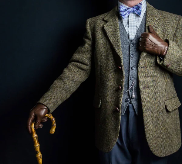 Portrait of Man in Tweed Suit and Leather Gloves Holding Umbrella. Vintage Style of Classic English Gentleman.