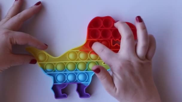 Women Hands Crumple Play Large Dinosaur Pop Close Top View — Stok video