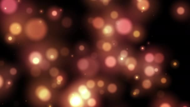 金とピンクの抽象的なボケの背景輝くライト効果 Ledライトからの多色光が閉じます 穀物ぼやけたノイズ 柔らかい焦点 お祝い テキストのためのお祭りの背景 — ストック動画