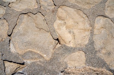 Kahverengi çakıl taşları denizcilik tarzında, arkaplan taşı dokusunda