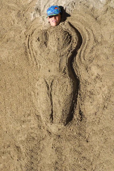 Boy Head Peeks Out Sand Body Buried Sand Summer Fun — Stock Photo, Image