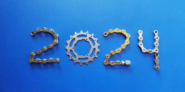 2024 Ciclos Concepto Fondo Con Cadena Oro Parte Bicicleta Sobre Imagen de archivo