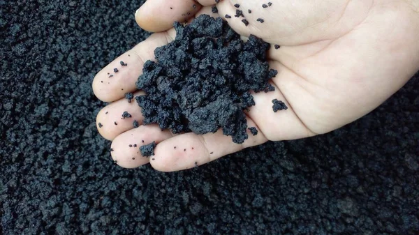 black lava soil sand close up photo