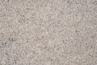 Koyu benekli bej mermerden güzel soyut bir arkaplan. Tasarım şablonu.