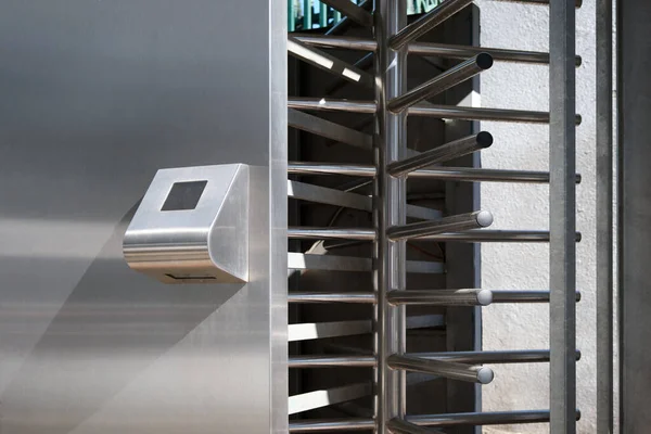 Turnstile for the passage of fans to the stadium using an electronic fan card. Modern security technologies.
