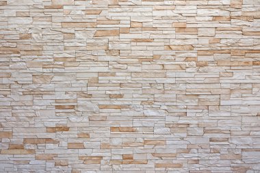 Yakın plan, soyut bej mermer duvarlı, yabani taşlı. Tasarım şablonu.