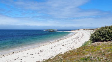 Panoramic view of the beautiful beach of Ile Saint Nicolas, main island of the famous Glnan archipelago located off the Brittany coast of Concarneau in the Morbihan department in western France