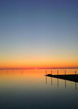 splendid sunset over the Arcachon basin in the New Aquitaine region in south-west France                     