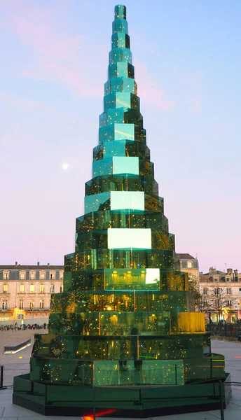 Stunning eco-friendly exposed glass Christmas tree on Place Pey Berland, near Saint-Andr Cathedral in Bordeaux, a UNESCO World Heritage city in southwestern France, Gironde