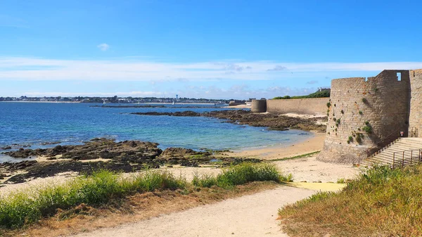 Port Louis (Brittany, north-western France): Lohic beach at the foot of the ramparts of the citadel, facing Gavres and the port of Lorient. Superb walk on a coastal path