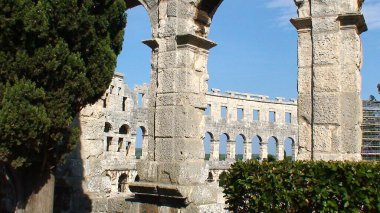 in Pula in Croatia, on the Adriatic Sea, the ancient Roman amphitheater is the largest amphitheater outside Italy. Built at the same time as the Colosseum in Rome, it was made during the reign of Emperors Augustus and Vespasian in the 1st century