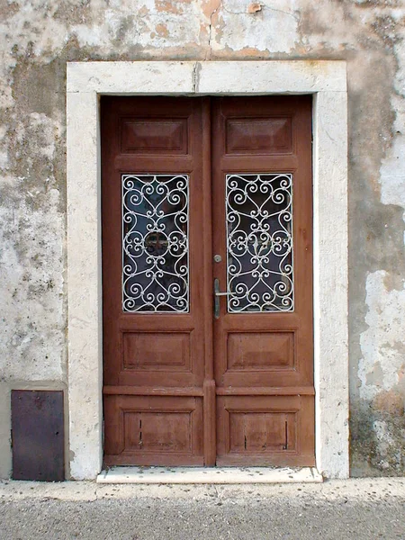 old solid door of a house in Dubrovnik, nicknamed the pearl of the Adriatic Sea in Croatia
