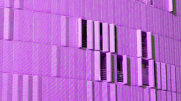 purple windows with closed shutters in front of an office building located in Bordeaux - New Aquitaine