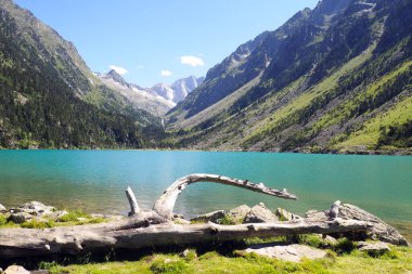 Lac de Gaube is a wonderful high altitude lake located in the heart of the Cirque de Gavarnie, in the Cauterets valley at the foot of the Vignemale mountain in the Pyrenees in southern France clipart