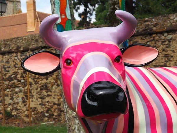 stock image Pretty little cow in purple and pink shades