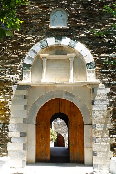 In the Cyclades, on the island of Andros: gateway to the monastery of Agios Nikolaos which has relics of saints, the most venerable of which is part of the skull of Joseph of Arimimathea