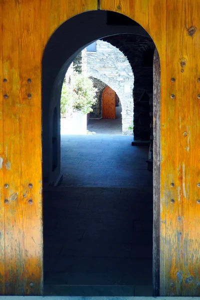 In the Cyclades, on the island of Andros: inner gate of the monastery of Agios Nikolaos which has relics of saints, the most venerable of which is part of the skull of Joseph of Arimimathea