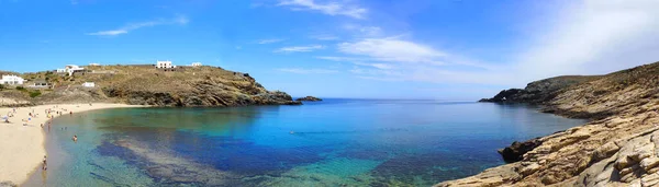 panoramic view of the bay of Ano Mera and its beach in Mykonos, a superb little Greek island in the Cyclades archipelago, in the heart of the Aegean Sea