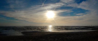 backlight on a beach in Arcachon, a famous seaside resort, located on the Atlantic coast in New Aquitaine, in the Bordeaux region