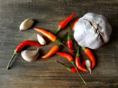 Condiments on a wooden cutting board