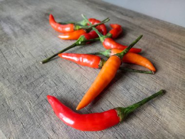Condiments on a wooden cutting board