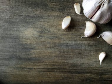 Condiments on a wooden cutting board