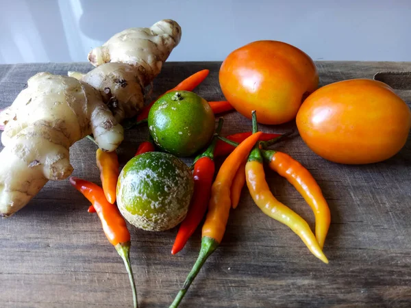 Condiments on a wooden cutting board