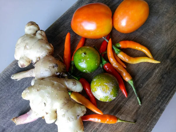 Condiments on a wooden cutting board