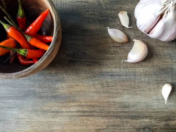 Condiments on a wooden cutting board