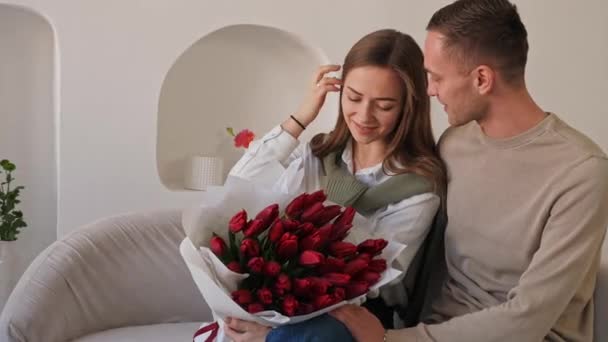 Guy Gave Girl Large Bouquet Tulips She Happy Enjoys Tulips — Stock Video