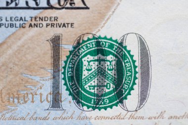 One hundred dollars , close - up . With small details.