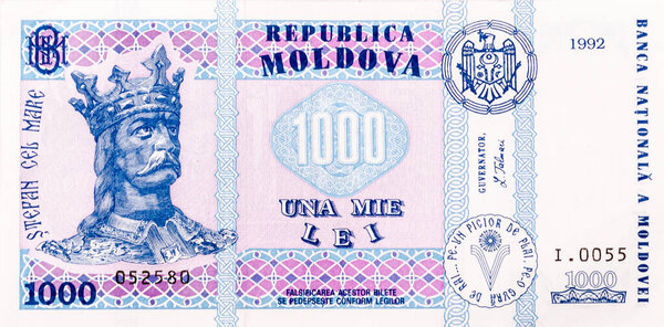 Moldovan leu. Banknote of one thousand Moldovan lei. Close-up of a banknote with many small details. With the image of Stefan cel Mare. Macro shooting. Photographed on a white background.