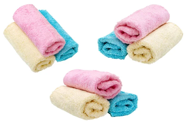 Drei Rollen Sauberer Pastellfarbener Handtücher Isoliert Auf Weißem Hintergrund Stockbild