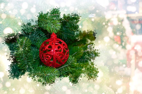 Red Patterned Ball Spruce Branches Blurry Holiday Background Concept Winter Fotos de stock libres de derechos