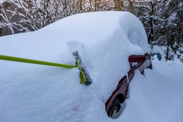 Clearing the car from a large amount of snow