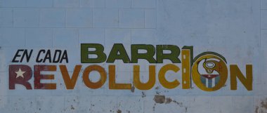 Cuba, Cienfuegos, August 8, 2014: Cuban text on a wall in the city of Cienfuegos