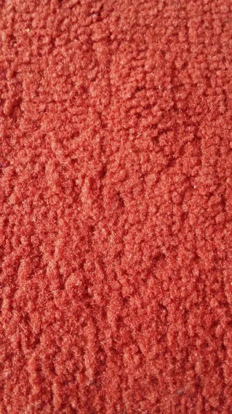 close-up view of the orange floor carpet