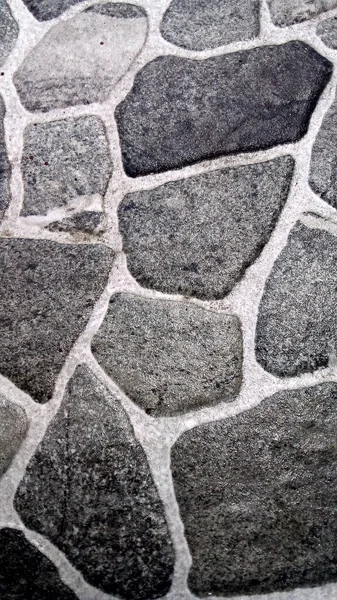 stone-textured floor tiles