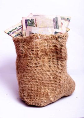 Egyptian money in a burlap bag of two hundred pounds