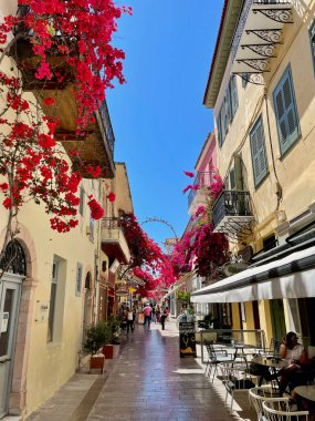 A View of People Strolling in Alleys