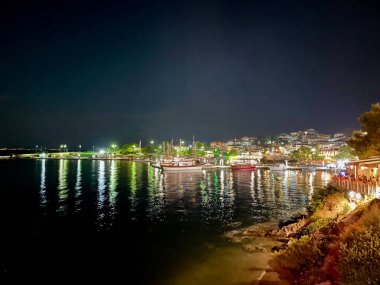 Shoreline Under the Lights