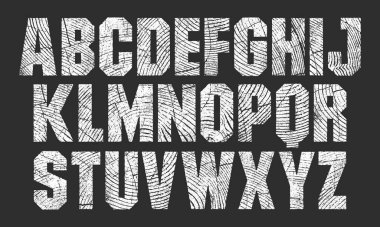 Rough Woodcut Letterpress Texture Bold Condensed Font. Detailed individually textured characters with a distressed Endgrain Tree Rings Wood Texture. Unique design font clipart