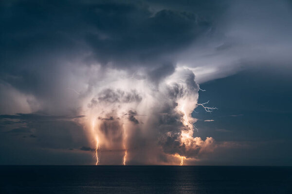 Huge Lightning storm and Clouds over the Atlantic Ocean. High quality photo