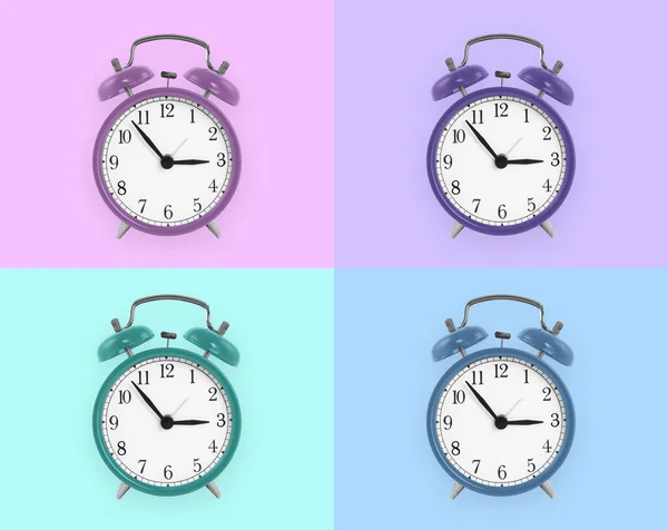 Cuatro Relojes Alarma Con Diferentes Colores —  Fotos de Stock