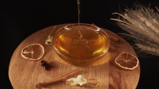 Healthy Organic Honey Plate Wooden Honey Dipper Top View Black — Stock video