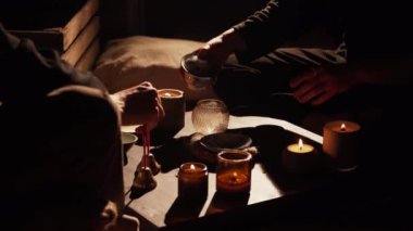 Brewing puerh tea. Traditional chinese tea ceremony. Tea pouring to teapot on a tea tray