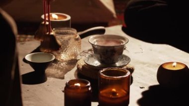 Brewing puerh tea. Traditional chinese tea ceremony. Tea pouring to teapot on a tea tray