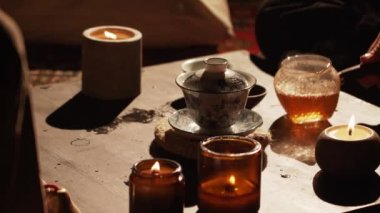 Brewing puerh tea. Traditional chinese tea ceremony. Tea pouring to teapot on a tea tray
